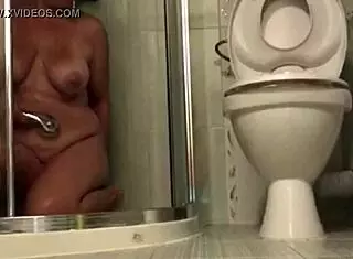 Sexy milf bathes, but what's hidden?