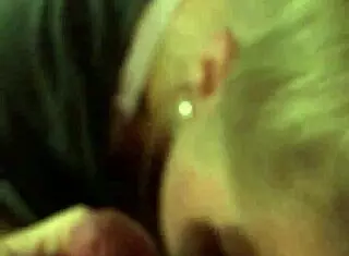 wife eagerly sucking her husband's big cock in the bedroom, teasing with her tongue