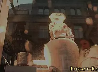 Glamorous babe toys with buttplug in solo play