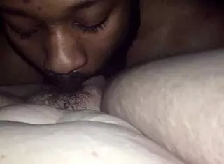 Licking pussy and ass teasingly.