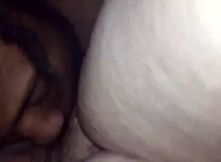 Licking pussy and ass teasingly.