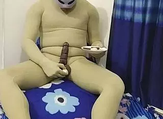 zentai slave gets into food fetish with bondage and cbt