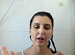 wet girl in white blouse sucks dick in the bath while moaning loudly