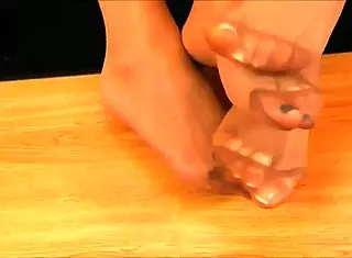 old dominatrix gives foot fetish instructions