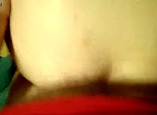 Amateur couple engages in passionate sex with pussy play and cumshot in homemade setting.