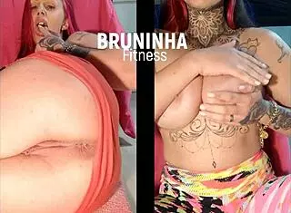 Watch me finger her oiled ass and show those big tits on split screen