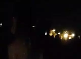 Babe gives beach blowjob, watchman interrupts.