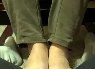 dylan teases with a footjob through sweatpants