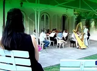 Black haired babe with big boobs fucks in a police costume, engaging in naughty acts.