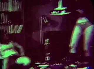 In a retro setting, three hairy lesbians engage in a vintage group scene