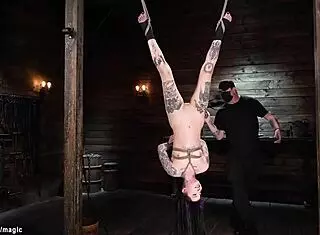 tattooed model restrained and disciplined