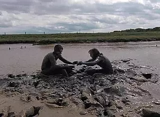 Mud wrestling: who wins, women or man in wet mess?