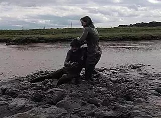 Mud wrestling: who wins, women or man in wet mess?