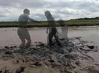 Mud wrestling: who wins, women or man in wet mess?