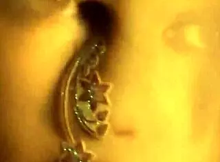 Bollywood brunette dancer teases with striptease moves