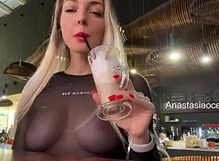 Public sexy blonde flashes big natural tits in crowded cafe 😍