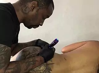 Exotic Dancer Gets Tattoo In Cincinnati