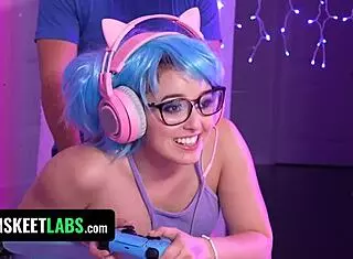 Leana and Krissy, curvy gamers in pigtails, get juicy pussies pounded doggystyle in threesome while playing.