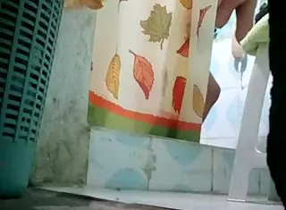 Tia Strips Naked Revealing Her Large Boobs