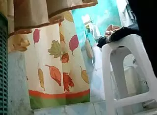 Tia Strips Naked Revealing Her Large Boobs