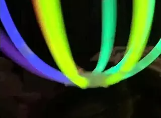 tatted rave chick sucks dick with glowsticks with creampie