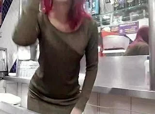 Redhead Prepares In Snack Bar Kitchen