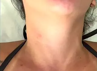 The wife performs an oral blowjob wearing pink lipstick, leading to a close-up cumshot in this sexy amateur fetish video.