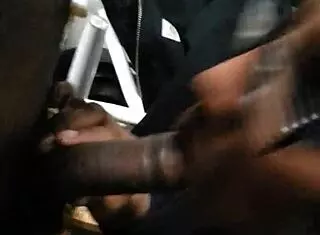 Ebony babe sucks black cock with glasses