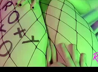 Pornstar Roxy Lights gets her pussy fucked intensely through fishnets.