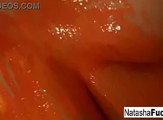 Busty Natasha Nice Shoots A Fun And Sexy Black Light Video