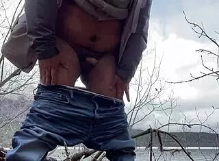 Spying on hairy gay guys jerking off in the wild outdoors