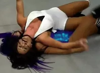 Gabi Castrovinci and Raquel wrestle in the garage with extra moves