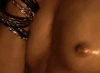 Beautiful Indian brunette milf enjoys Bollywood solo