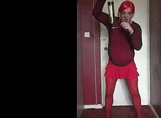 Sissy crossdresser swallows piss without caring who likes it.