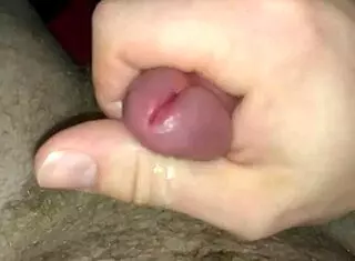 she's masturbating and gets a messy cumshot all over her belly before something