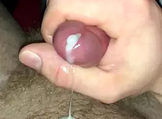 she's masturbating and gets a messy cumshot all over her belly before something