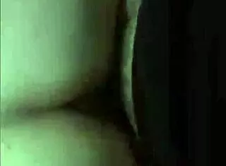 wife dances on her brother-in-law's lap in a family gathering