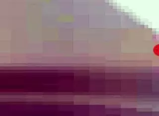 Cute girl undresses while dancing sexily on stage