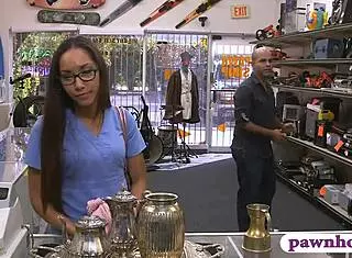 Babe with glasses gets pounded hard by the pawn keeper in the shop