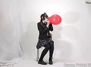 Girl casually plays with colorful balloons