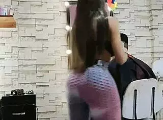 following the stylist in her shop