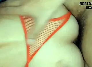 Detailed scene of a woman eagerly taking two large cocks deep into her tight ass, moaning with pleasure as they thrust rhythmically.