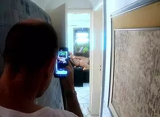 The white head watches the boat house from afar