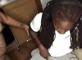 ebony girl gives detailed blowjob to black guy while he's gaming