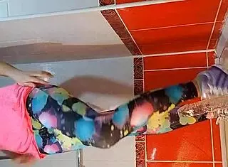 babe pees and masturbates with dildo in gym shower close up