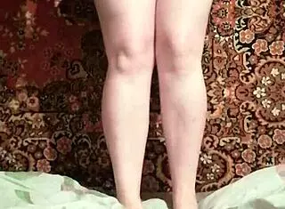 Pretty Woman with Clothespins on Her Nipples