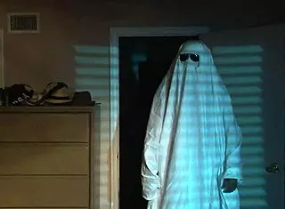 sexy nude blonde in halloween bed