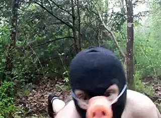 outdoor bdsm session in the forest