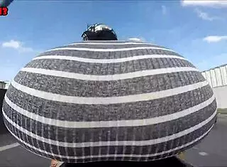 Hot Brunette Rides Motorcycle Showing Ass In Public