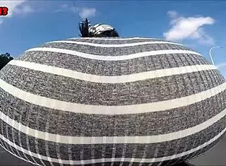 Hot Brunette Rides Motorcycle Showing Ass In Public